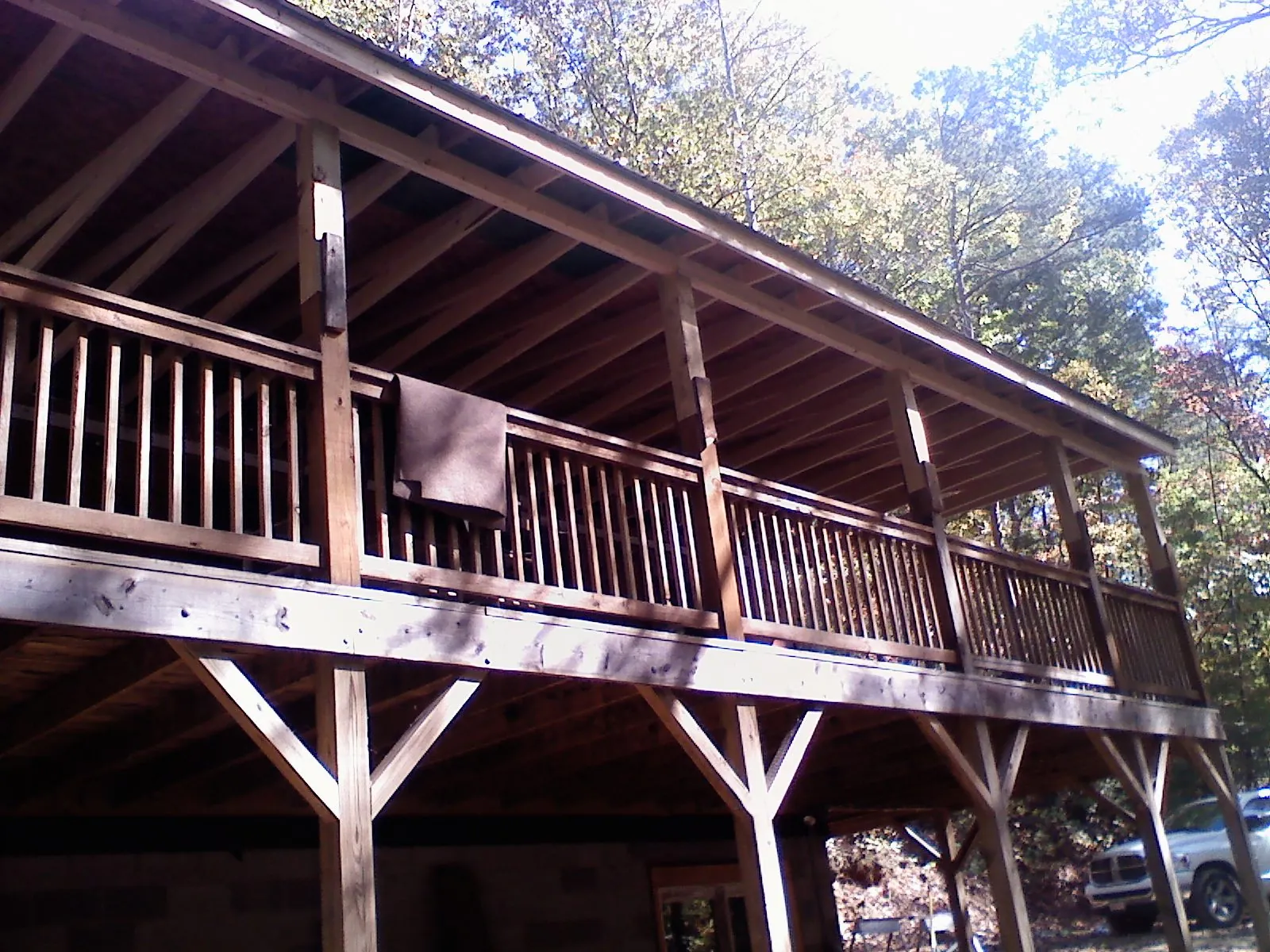 Timber framing under a new elevated porch and deck — Roof Leak Repair in Chestnut Hill by Roofing Brothers